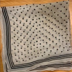Black and cream polka dotted scarf.